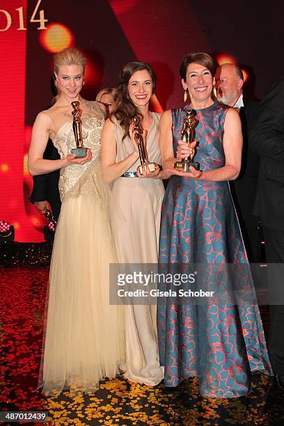 Larissa Marolt, Miriam Stein and Adele Neuhauser attend the 25th Romy Award 2014 at Hofburg Vienna on April 26, 2014 in Vienna, Austria.