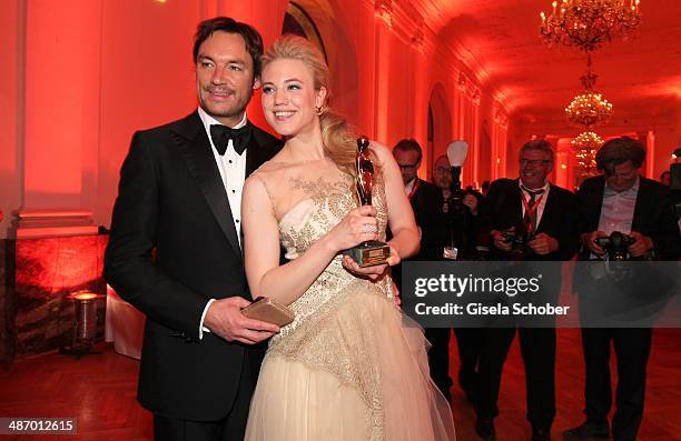 Larissa Marolt and her boyfriend Whitney Sudler - Smith attend the 25th Romy Award 2014 at Hofburg Vienna on April 26, 2014 in Vienna, Austria.