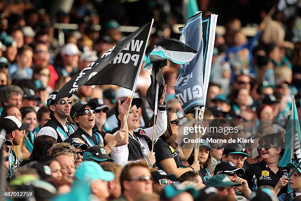 Spectators enjoy the atmosphere during the round six AFL match between Port Adelaide Power and the Geelong Cats at Adelaide Oval on April 27, 2014 in...