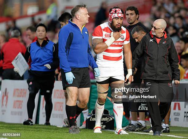 Ryo Holani of Japan leaves the field after being injured during the Japan v Georgia International Match at The Kingsholm Stadium on September 5, 2015...