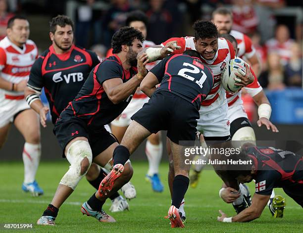 Amanaki Lelei Mafi of Japan tries to break through during the Japan v Georgia International Match at The Kingsholm Stadium on September 5, 2015 in...