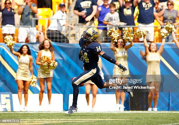 Avonte Maddox of the Pittsburgh Panthers reacts after returning a kick for a touchdown at the end of the first half against the Youngstown State...