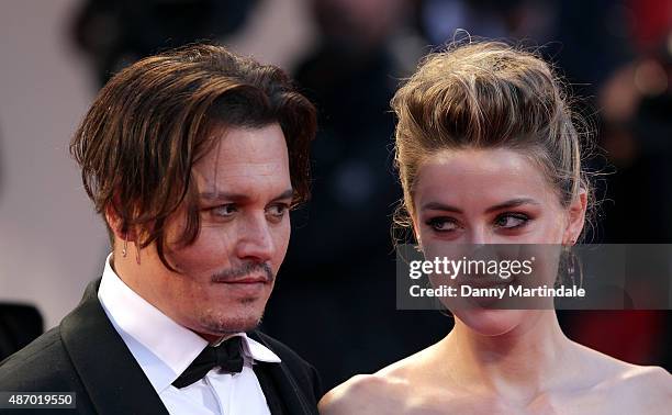 Johnny Depp and actress Amber Heard attends a premiere for 'A Danish Girl' during the 72nd Venice Film Festival at on September 5, 2015 in Venice,...