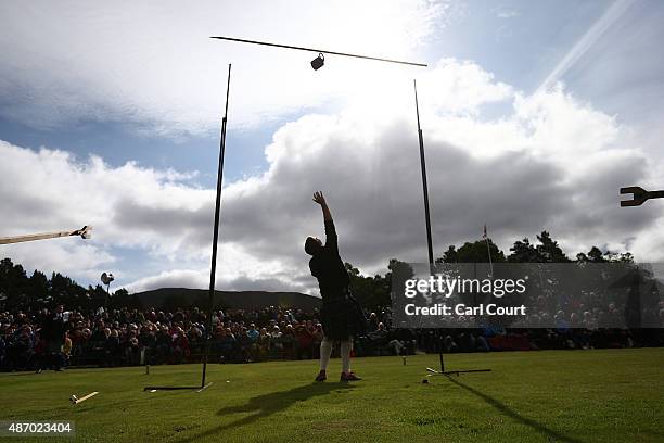 Participant takes part in the weight over the bar throwing competition at the Braemar Gathering on September 5, 2015 in Braemar, Scotland. There has...