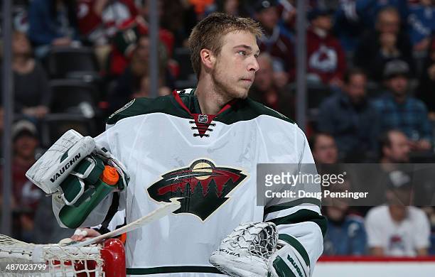 Goalie Darcy Kuemper of the Minnesota Wild looks on during a break in the action against the Colorado Avalanche Game Five of the First Round of the...