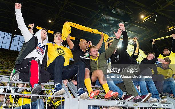 Leonardo de Deus Santos celebrates with the fans during the farewell match of Dede at Signal Iduna Park on September 5, 2015 in Dortmund, Germany.