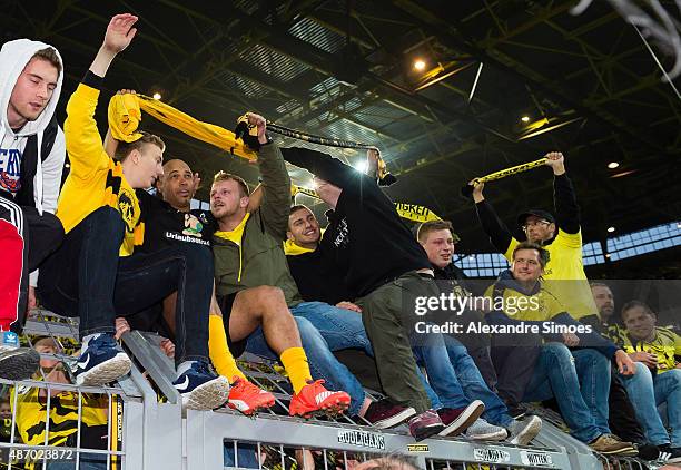 Leonardo de Deus Santos celebrates with the fans during the farewell match of Dede at Signal Iduna Park on September 5, 2015 in Dortmund, Germany.