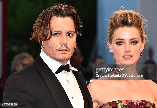 Johnny Depp and Amber Heard attends the premiere for 'A Danish Girl' during the 72nd Venice Film Festival at on September 5, 2015 in Venice, Italy.