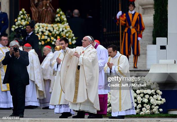 Pope Francis leads the canonisation mass in which John Paul II and John XXIII are to be declared saints on April 27, 2014 in Vatican City, Vatican....