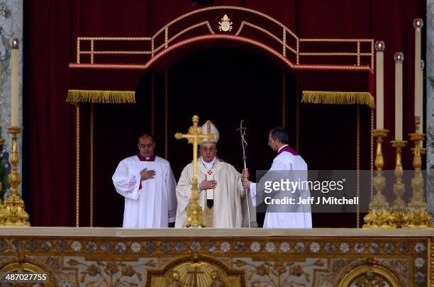 Pope Francis leads the canonisation mass in which John Paul II and John XXIII are to be declared saints on April 27, 2014 in Vatican City, Vatican....