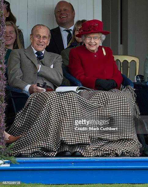 Queen Elizabeth II and Prince Philip, Duke of Edinburgh attend the Braemar Gathering on September 5, 2015 in Braemar, Scotland. There has been an...