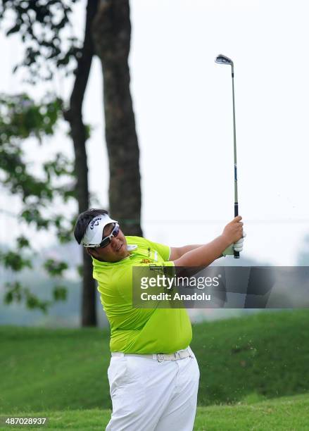 Kiradech Aphibarnrat of Thailand in action during the final round of the CIMB Niaga Indonesian Masters at Royale Jakarta Golf Club on April 27, 2014...