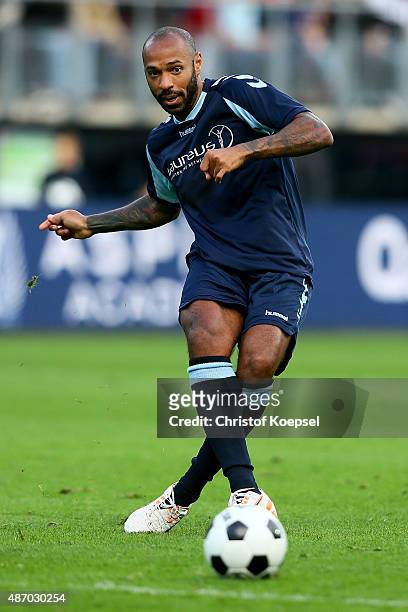 Thierry Henry of Laureus Allstaers passes the ball during the Laureus KickOffForGood Charity Match between Laureus All Stars against Real Madrid...