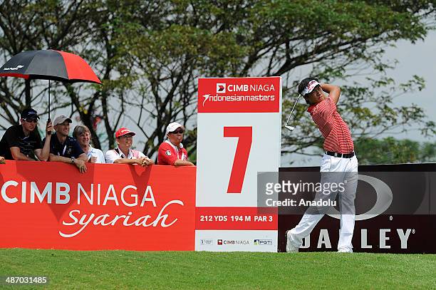 Gunn Charoenkul of Thailand in action during the final round of the CIMB Niaga Indonesian Masters at Royale Jakarta Golf Club on April 27, 2014 in...