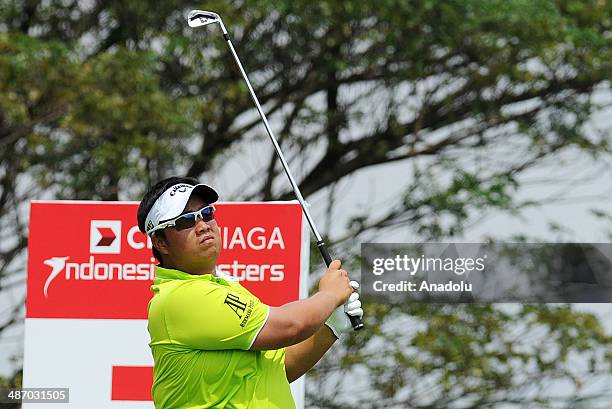 Kiradech Aphibarnrat of Thailand in action during the final round of the CIMB Niaga Indonesian Masters at Royale Jakarta Golf Club on April 27, 2014...