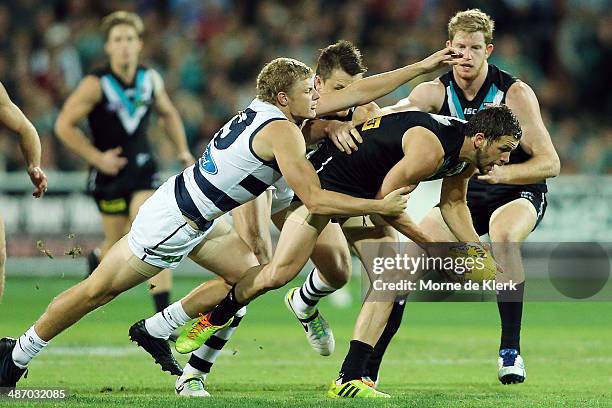 Travis Boak of the Power wins the ball during the round six AFL match between Port Adelaide Power and the Geelong Cats at Adelaide Oval on April 27,...