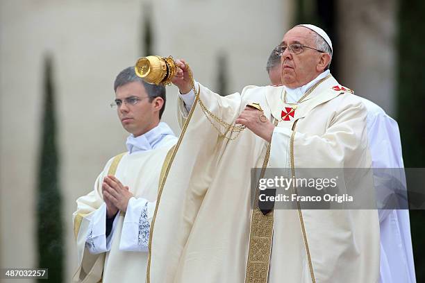 Pope Francis leads the Canonisation Mass in which John Paul II and John XXIII are to be declared saints on April 27, 2014 in Vatican City, Vatican....