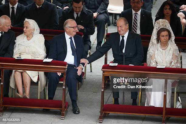 Queen Paola and King Albert II of Belgium, King Juan Carlos and Queen Sofia of Spain talk before the canonisation mass of Popes John XXIII and John...