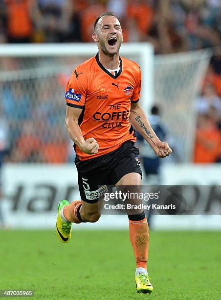 Ivan Franjic of the Roar celebrates after team mate Besart Berisha scores a goal during the A-League Semi Final match between the Brisbane Roar and...