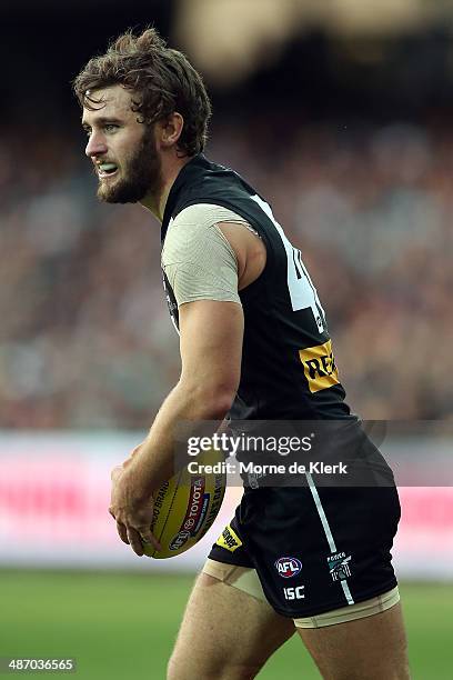 Sam Gray of the Power runs with the ball during the round six AFL match between Port Adelaide Power and the Geelong Cats at Adelaide Oval on April...