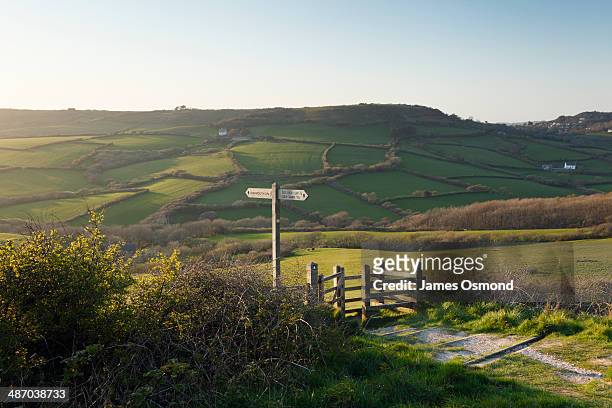 signpost and gate - rural scene stock pictures, royalty-free photos & images