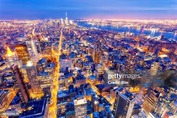 new york, midtown manhattan, aerial view at dusk - one world trade center stock pictures, royalty-free photos & images