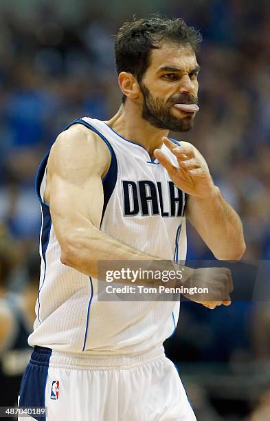 Jose Calderon of the Dallas Mavericks celebrates against the San Antonio Spurs during Game Three of the Western Conference Quarterfinals during the...