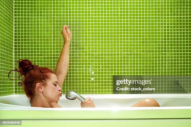 great music in bathtub - singing shower stock pictures, royalty-free photos & images