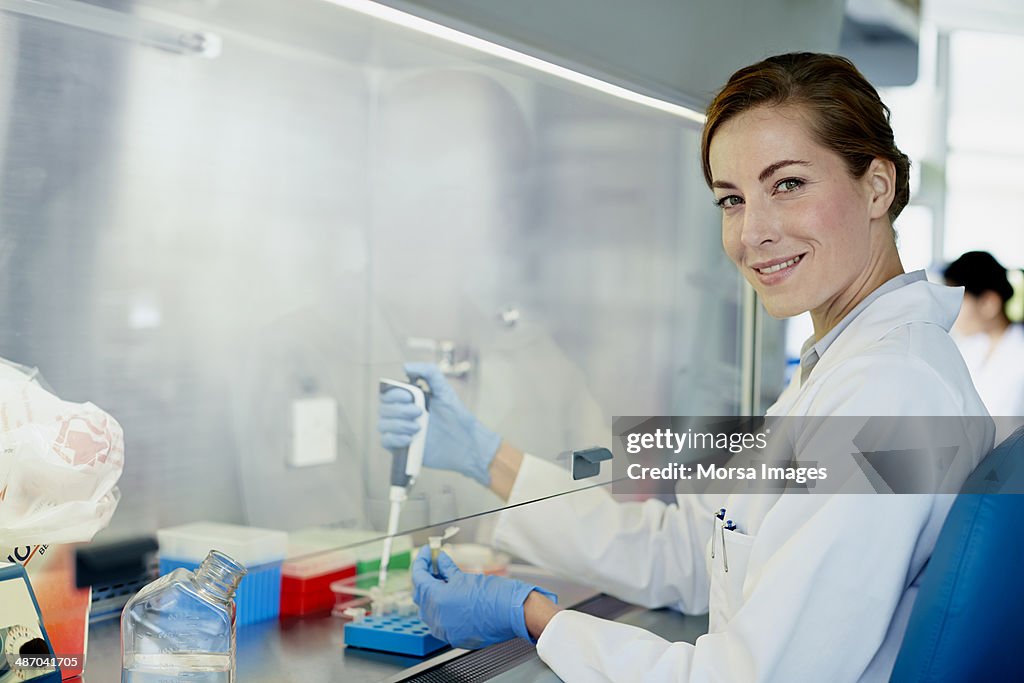 Portrait of smiling female scientist