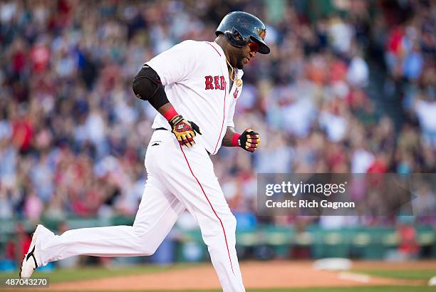 David Ortiz of the Boston Red Sox runs the bases after his 496th career home run during the fourth inning against the Philadelphia Phillies at Fenway...