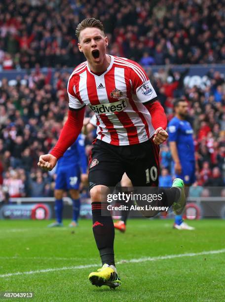 Connor Wickham of Sunderland celebrates scoring the opening goal during the Barclays Premier League match between Sunderland and Cardiff City at the...