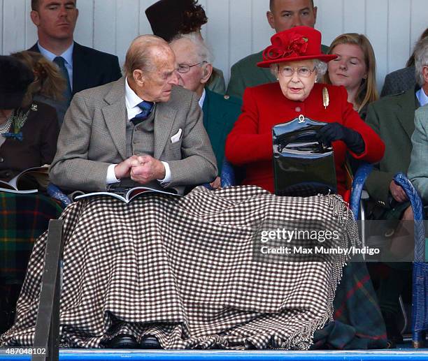 Prince Philip, Duke of Edinburgh and Queen Elizabeth II attend the Braemar Gathering at The Princess Royal and Duke of Fife Memorial Park on...