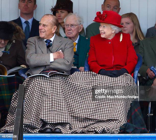 Prince Philip, Duke of Edinburgh and Queen Elizabeth II attend the Braemar Gathering at The Princess Royal and Duke of Fife Memorial Park on...