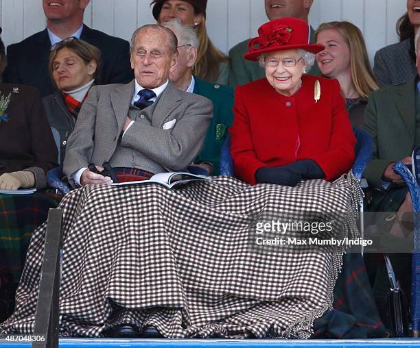 Prince Philip, Duke of Edinburgh and Queen Elizabeth II attend the Braemar Gathering at The Princess Royal and Duke of Fife Memorial Park on...