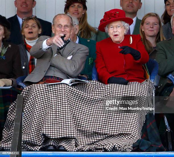 Prince Philip, Duke of Edinburgh and Queen Elizabeth II attend the Braemar Gathering at The Princess Royal and Duke of Fife Memorial Park on...