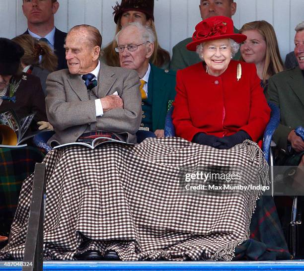 Prince Philip, Duke of Edinburgh and Queen Elizabeth II attend the Braemar Gathering at The Princess Royal and Duke of Fife Memorial Park on...