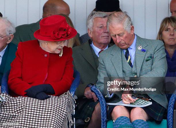 Queen Elizabeth II and Prince Charles, Prince of Wales attend the Braemar Gathering at The Princess Royal and Duke of Fife Memorial Park on September...