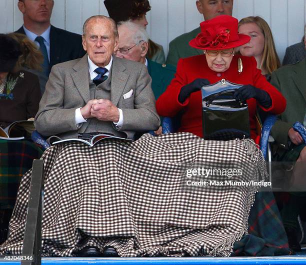 Prince Philip, Duke of Edinburgh and Queen Elizabeth II attend the Braemar Gathering at The Princess Royal and Duke of Fife Memorial Park on...