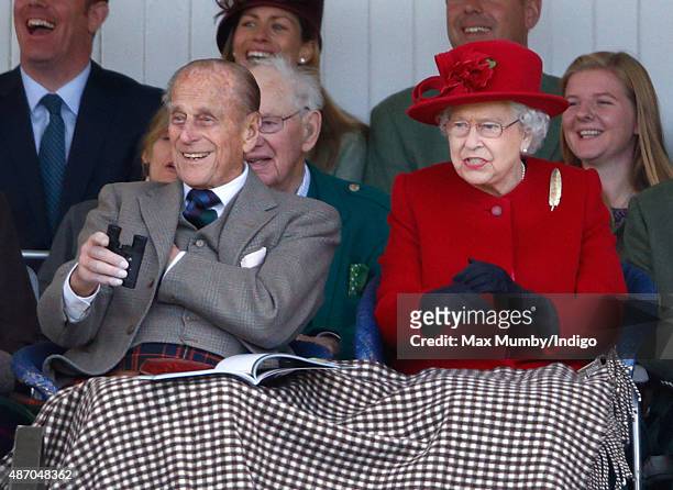 Prince Philip, Duke of Edinburgh and Queen Elizabeth II attend the Braemar Gathering at The Princess Royal and Duke of Fife Memorial Park on...