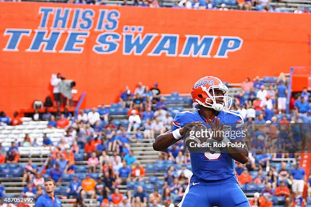 Quarterback Treon Harris of the Florida Gators warms up prior to the start of the game against the New Mexico State Aggies at Ben Hill Griffin...