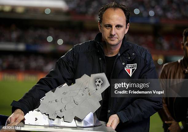 Rogerio Ceni receives a trophy for 25 years playing for Sao Paulo during the match between Sao Paulo and Internacional for the Brazilian Series A...