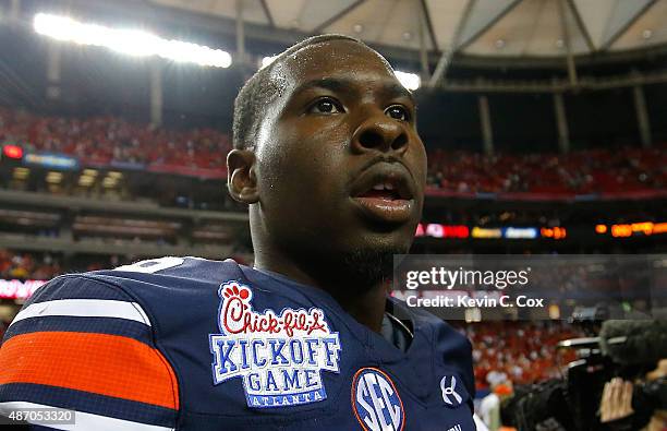 Jeremy Johnson of the Auburn Tigers celebrates their 31-24 win over the Louisville Cardinals at Georgia Dome on September 5, 2015 in Atlanta, Georgia.