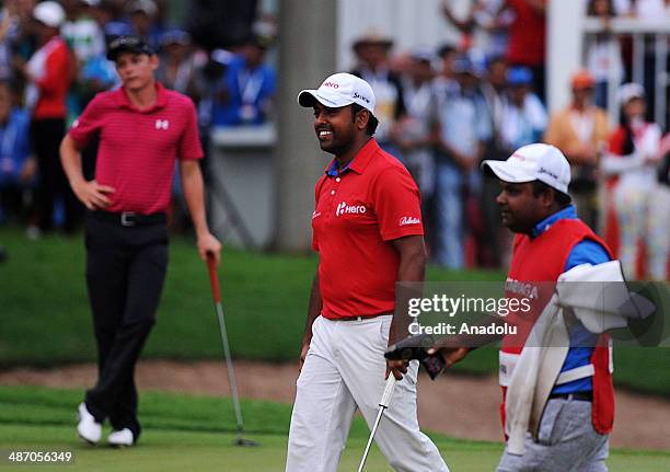 Anirban Lahiri of India celebrates after winning the final round of the CIMB Niaga Indonesian Masters at Royale Jakarta Golf Club on April 27, 2014...