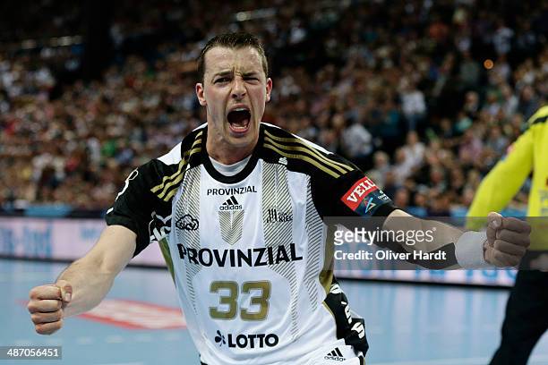 Dominik Klein of Kiel celebrates after his scoring during the Velux EHF Champions League quarter final handball match between THW Kiel and MKD HC...