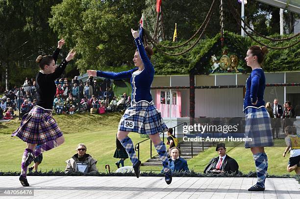 Competitors take part in the Highland dancing competition during the Braemar Highland Games on September 05, 2015 in Braemar, Scotland. There has...