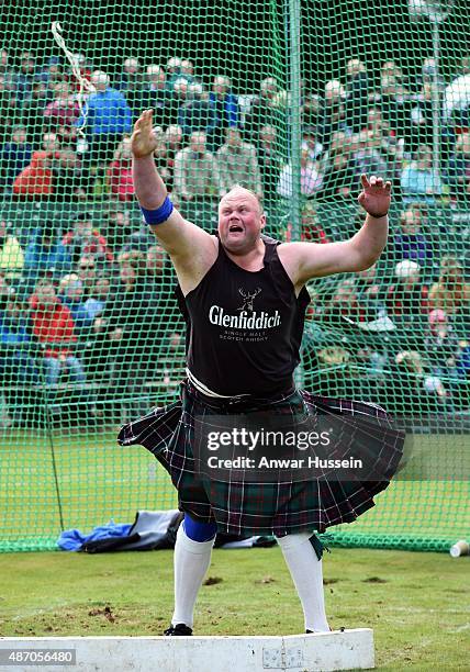 Competitor takes part in the hammer throwing competition during the Braemar Highland Games on September 05, 2015 in Braemar, Scotland. There has been...