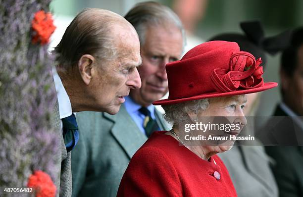 Prince Philip, Duke of Edinburgh, Prince Charles, Prince of Wales and Queen Elizabeth ll, attend the Braemar Highland Games on September 05, 2015 in...