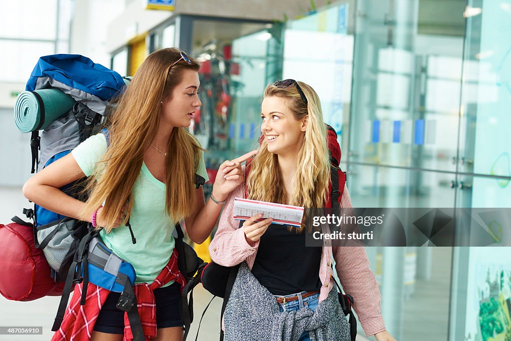 Backpacking friends undertake the next part of their journey