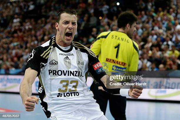 Dominik Klein of Kiel celebrates after his scoring during the Velux EHF Champions League quarter final handball match between THW Kiel and MKD HC...