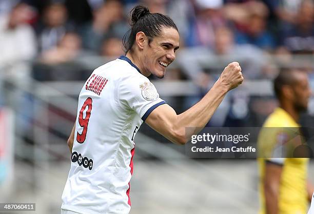 Edinson Cavani of PSG celebrates scoring his team's first goal during the French Ligue 1 match between FC Sochaux Montbeliard and Paris Saint-Germain...